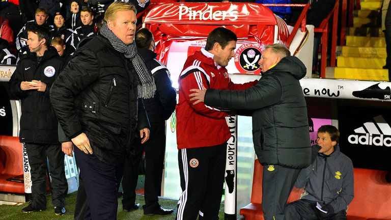 Sheffield United's English manager Nigel Clough and Southampton's manager Ronald Koeman