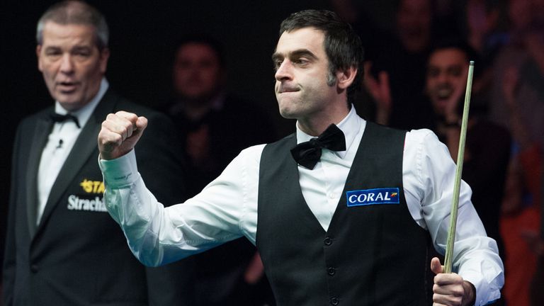 Ronnie O'Sullivan celebrates a maximum break of 147 in the final frame of his 6-0 victory over Matthew Selt during the 2014 Coral UK Championship at the Ba