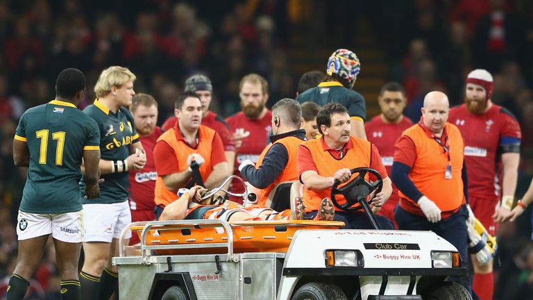 Jean de Villiers is stretchered from the field