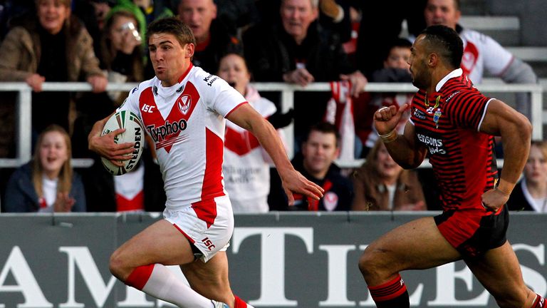  Tommy Makinson (L) of St Helens in action during the Stobart Super League play off match between St Helens and Warringt