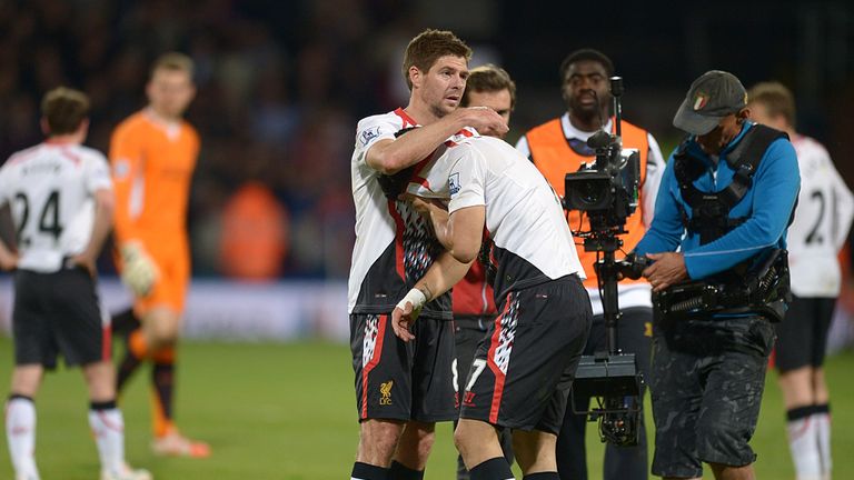Liverpool's Luis Suarez (right) is consoled by team-mate Steven Gerrard after the final whistle against Crystal Palace