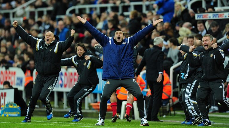 Sunderland manager Gus Poyet celebrates the opening goal from Adam Johnson during the Barclays Premier League match between Newcastle United and Sunderland