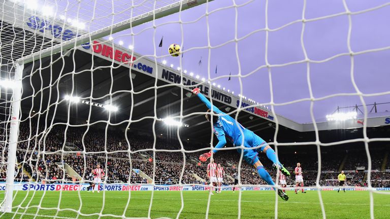 Sunderland goalkeeper Costel Pantilimon saves from  Newcastle player Ayoze Perez