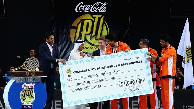 he winners cheque to the Indian Aces owners during the Coca-Cola International Premier Tennis League fourth leg at the Hamdan Sports Complex, 