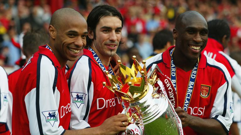 May 11, 2002: Thierry Henry, Robert Pires and Sol Campbell celebrate winning the league