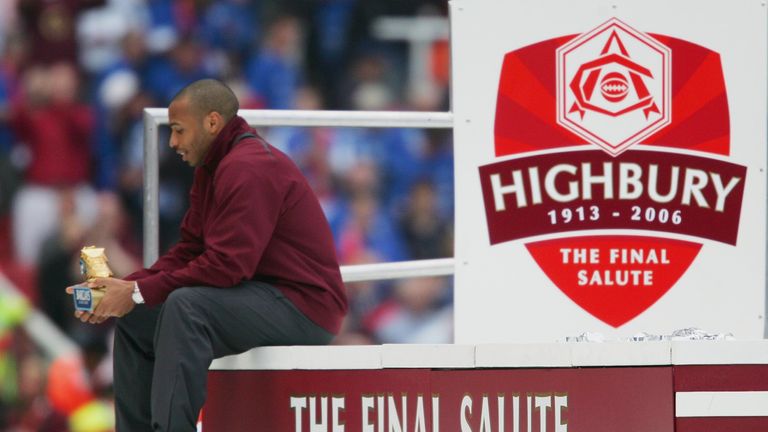 Henry examines his Golden Boot trophy after the last ever game at Highbury in 2006 that saw Arsenal beat Wigan 4-2.