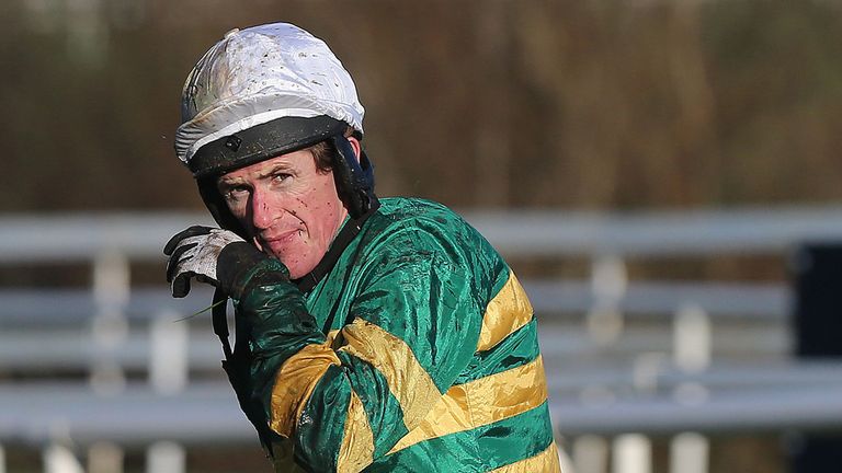 Tony McCoy looks dejected after falling from Speckled Wood in the Pertemps Network Handicap Hurdle at Leopardstown