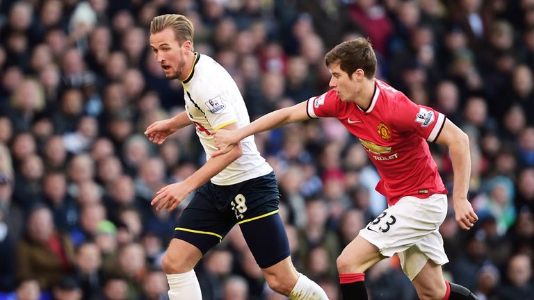 Harry Kane is pursued by Paddy McNair 