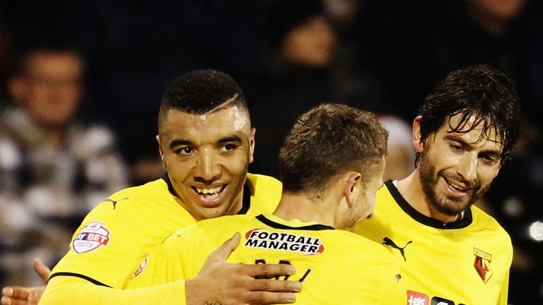 Watford goalscorers Troy Deeney and Almen Abdi celebrate during the Sky Bet Championship match between Fulham and Watford at Craven Cottage