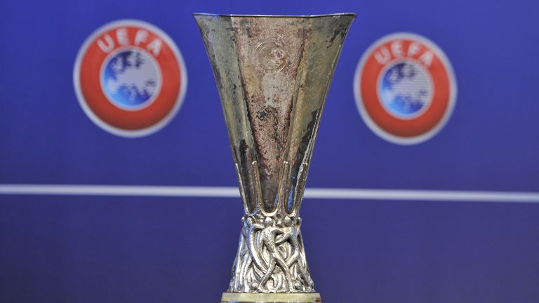 The UEFA Europa League trophy is displayed during the 2014/15 UEFA Europa League Play-off round draw at the UEFA headquarters