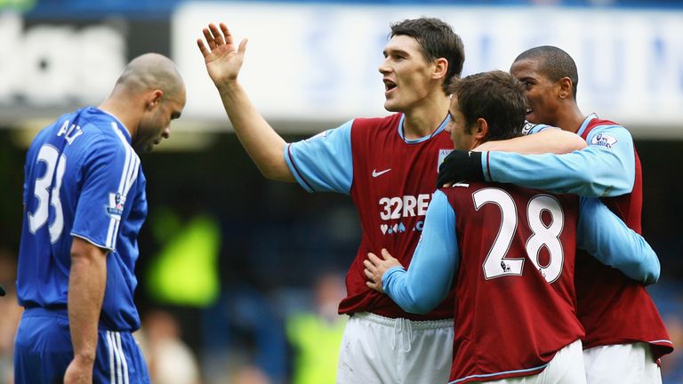 LONDON - DECEMBER 26:  Shaun  Maloney #28 of Aston Villa celebrates with teammate Gareth Barry (C) after scoring his team's second goal during the Barclays