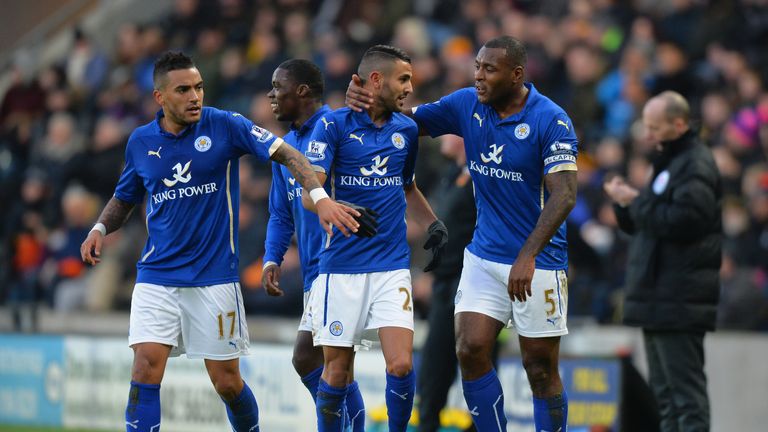 Wes Morgan (right) congratulates Riyad Mahrez on his winning goal at Hull