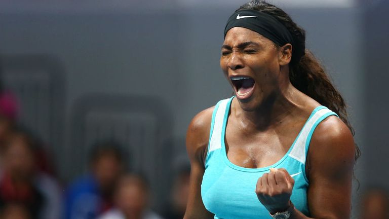 Serena Williams of the Singapore Slammers celebrates a point against Kirsten Flipkens