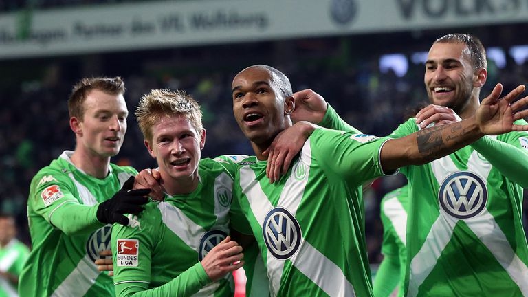 WOLFSBURG, GERMANY - DECEMBER 20: Naldo (3rd L) of Wolfsburg celebrates after scoring his team's second goal 