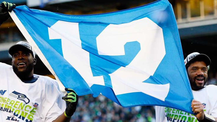 Kam Chancellor, Russell Wilson with 12 banner in Seattle