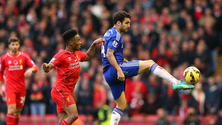 LIVERPOOL, ENGLAND - NOVEMBER 08:  Cesc Fabregas of Chelsea wins the ball ahead of Raheem Sterling of Liverpool during the Barclays Premier League match be