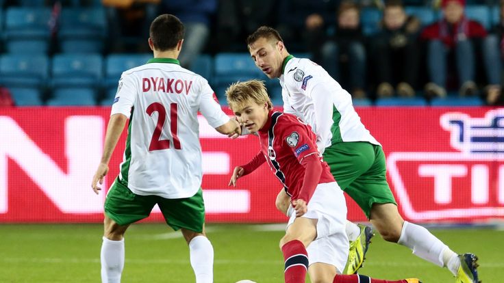 Norway's youngest player ever, Martin Odegaard (C) vies during the Euro 2016 Group H qualifying football match Norway vs Bulgaria in Oslo, Norway