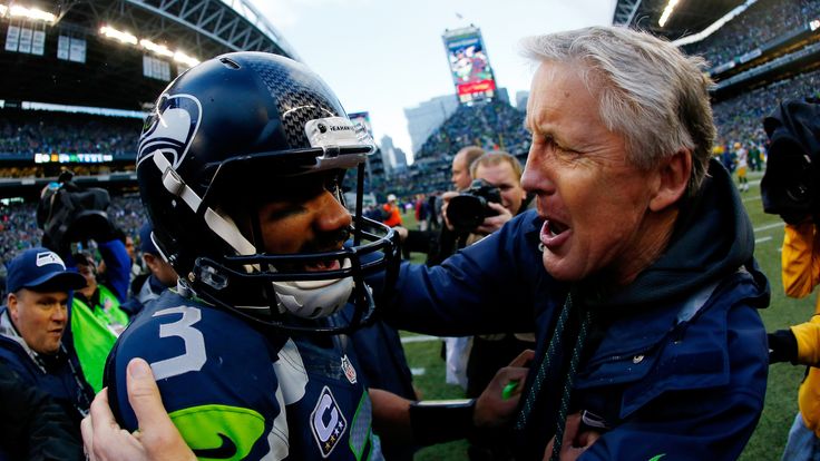 Seattle Seahawks head coach Pete Carroll and  Russell Wilson celebrate after the win over Green Bay