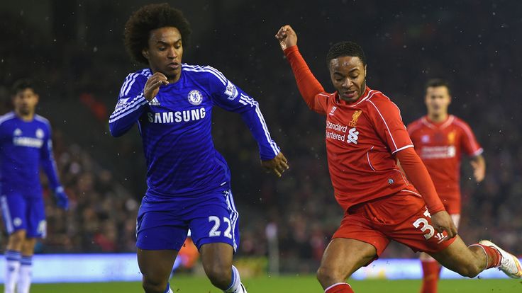 Chelsea's Willian closes down Raheem Sterling of Liverpool in the Capital One Cup semi-final first leg at Anfield