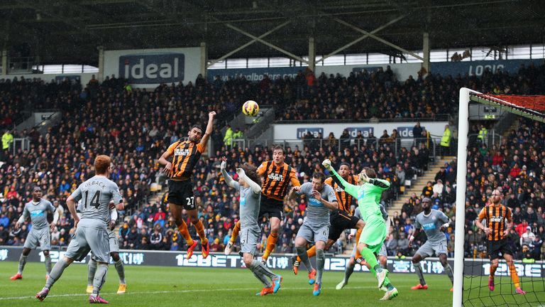 Ahmed Elmohamady of Hull City punches the ball into the Newcastle net
