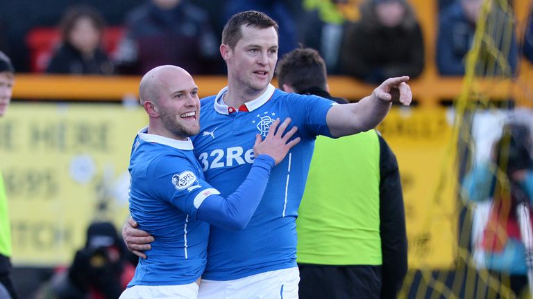 Rangers' Nicky Law celebrates with his team-mate Jon Daly