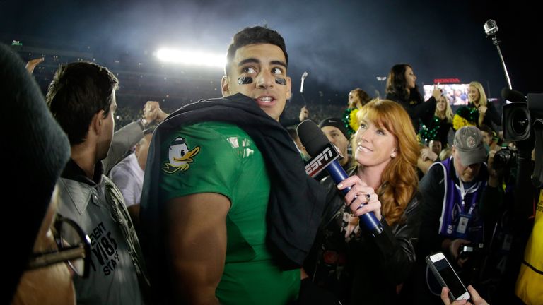 Quarterback Marcus Mariota #8 of the Oregon Ducks is interviewed after defeating the Florida State Seminoles 