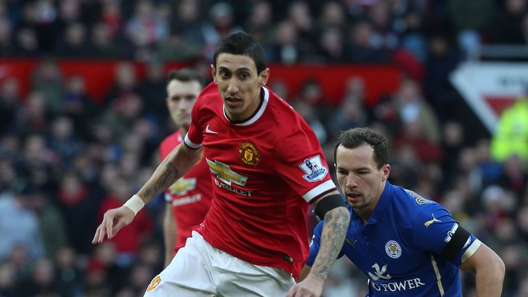 Angel di Maria of Manchester United in action with Danny Drinkwater of Leicester City