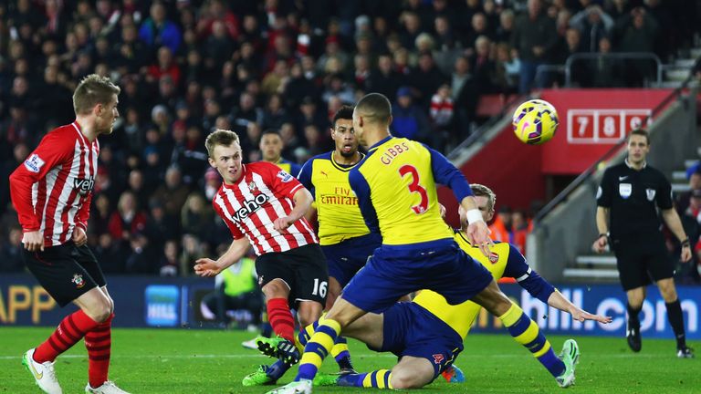 James Ward-Prowse has a shot past the Arsenal defence.