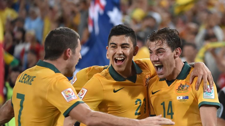 Australia's James Troisi (right) celebrates his winning goal.