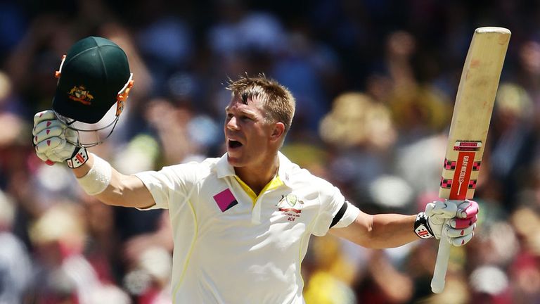 David Warner of Australia celebrates and acknowledges the crowd after scoring a century during day one of the Fourth Test 