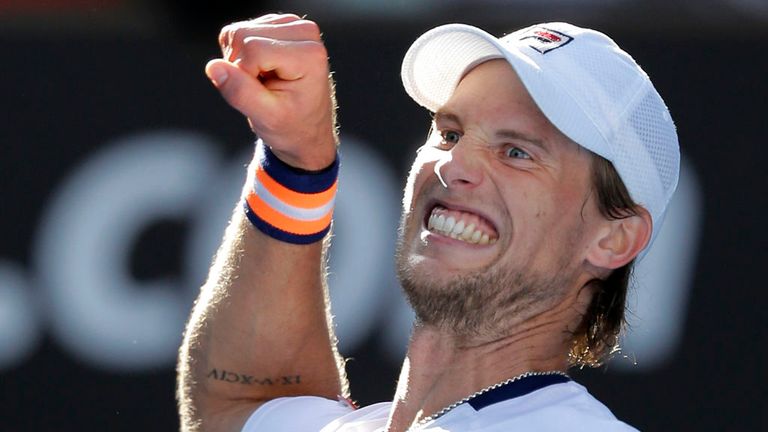 Andreas Seppi of Italy celebrates after defeating  Roger Federer of Switzerland at the Australian Open