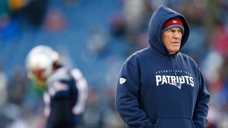 FOXBORO, MA - JANUARY 10:  Head coach Bill Belichick of the New England Patriots looks on during warm ups before the 2014 AFC Divisional Playoffs game agai