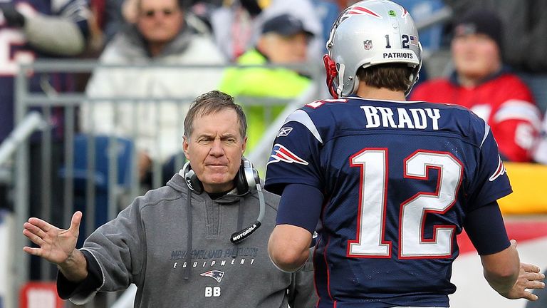 FOXBORO, MA - DECEMBER 4:   Tom Brady #12 of the New England Patriots celebrates with coach Bill Belichick after a touchdwon by  BenJarvus Green-Ellis #42 