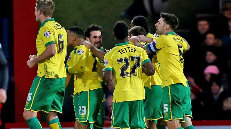 Cameron Jerome mobbed by Norwich team-mates