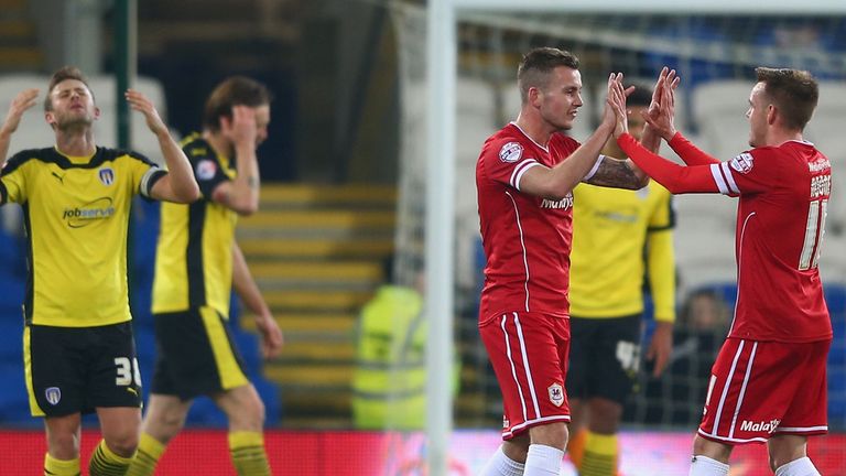 CARDIFF, WALES - JANUARY 02:  Joe Ralls (C) of Cardiff celebrates with Craig Noone (R) after scoring the opening goal during the FA Cup Third Round match b