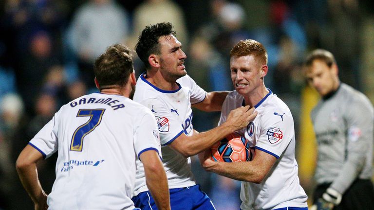 SCUNTHORPE, ENGLAND - JANUARY 06:  Eoin Doyle (R) of Chesterfield is congratulated by teammates after scoring a goal from the penalty spot during the FA Cu