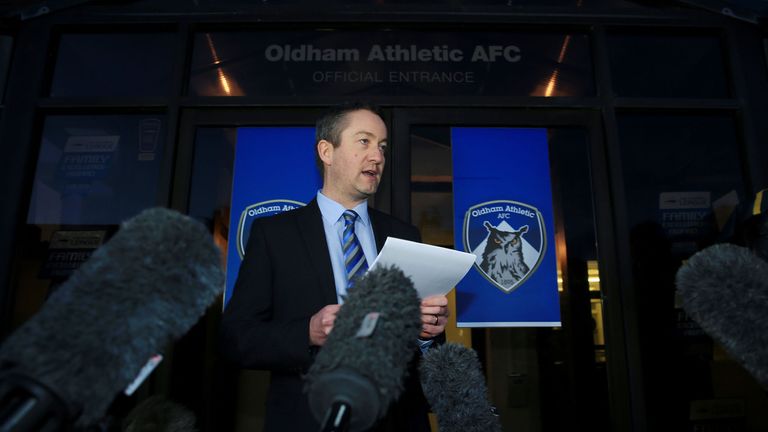 Oldham Athletic chief executive Neil Joy: Reads out a statement in relation to Ched Evans at Boundary Park
