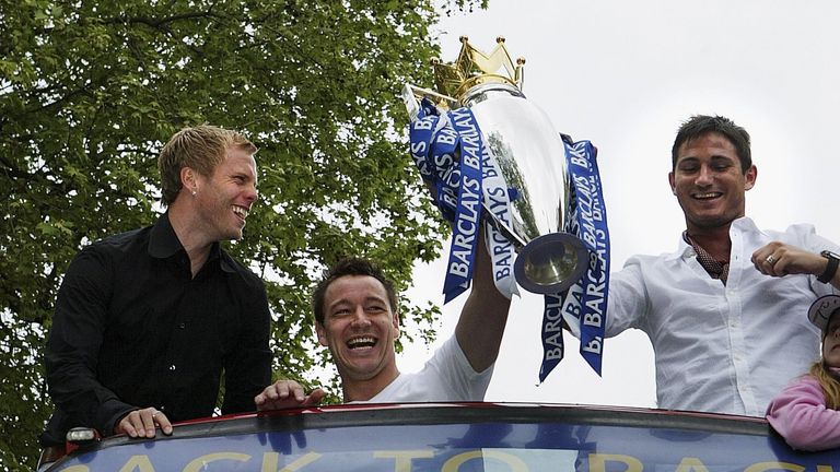 LONDON - MAY 14:  (L-R) Eidur Gudjohnsen, John Terry and Frank Lampard show the Premiership Trophy to the fans on the open-topped bus parade of the Barclay