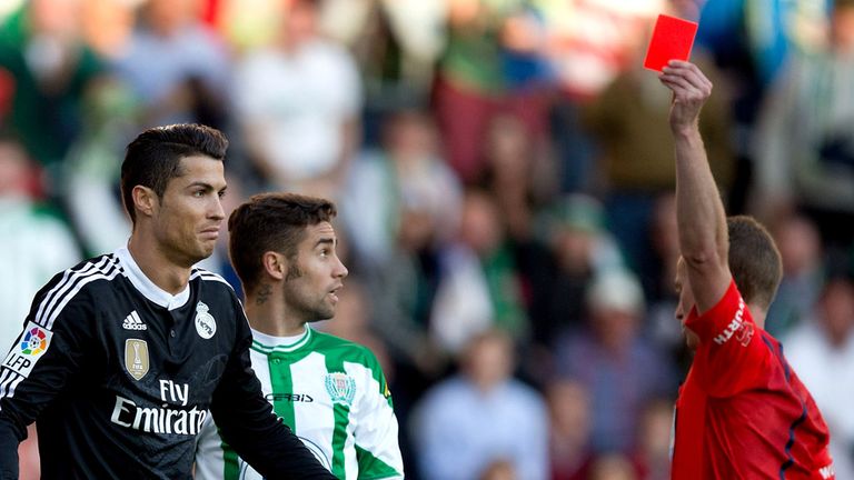 CORDOBA, SPAIN - JANUARY 24: Referee Hernandez Hernandez (L) shows the red card to Cristiano Ronaldo (L) of Real Madrid CF during the La Liga match between