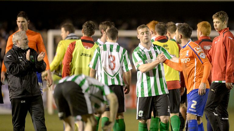 Blyth Spartans' Daniel Hawkins (second right) shakes hands with Birmingham City's Neal Eardley (right) after the FA Cup Third Round match at Croft Park