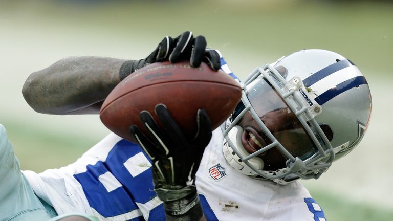 Dez Bryant #88 of the Dallas Cowboys attempts a catch over Sam Shields #37 of the Green Bay Packers during the 2015 NFC Divisional Playoff game
