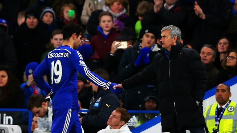 Diego Costa is greeted by Jose Mourinho