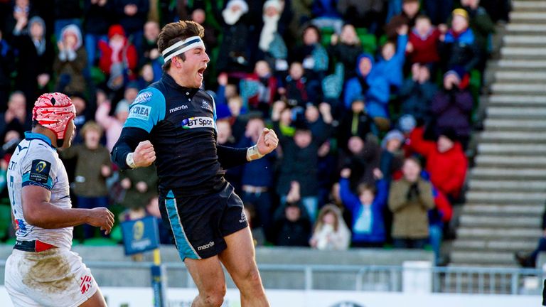 DTH van der Merwe celebrates scoring a hat-trick for Glasgow 