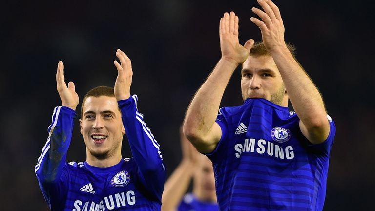 Eden Hazard and Branislav Ivanovic of Chelsea applaud the fans after the Capital One Cup Semi-Final first leg match between Liverpool and Chelsea