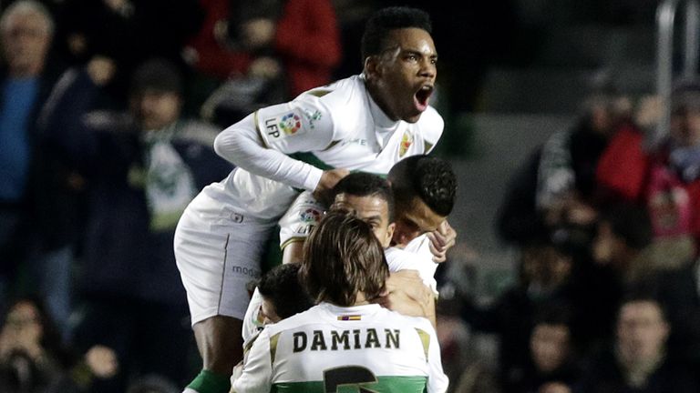 Elche platers celebrate their second goal during the Spanish league football match Elche FC v Villarreal