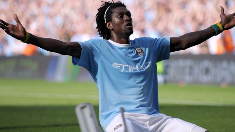 Emmanuel Adebayor of Manchester City celebrates in front of the Arsenal fans after scoring during the match between Manchester City and Arsenal 