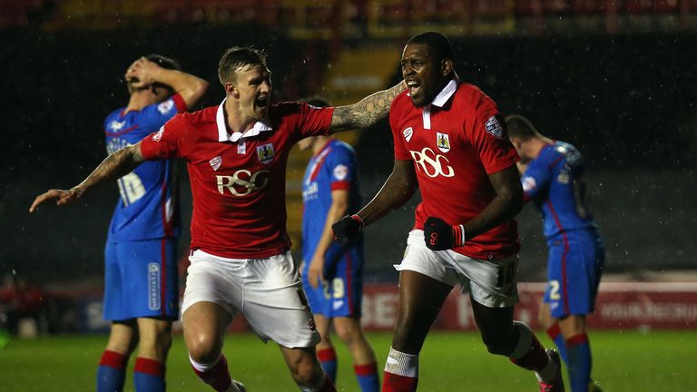 Jay Emmanuel-Thomas (r) of Bristol City celebrates scoring with team mate Aden Flint