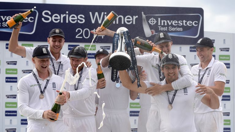 LONDON, ENGLAND - AUGUST 17:  England captain Alastair Cook lifts the series trophy after winning the 5th Investec Test match between England and India at 