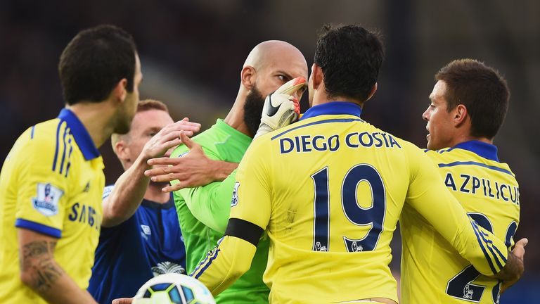 Tim Howard confronts Diego Costa.