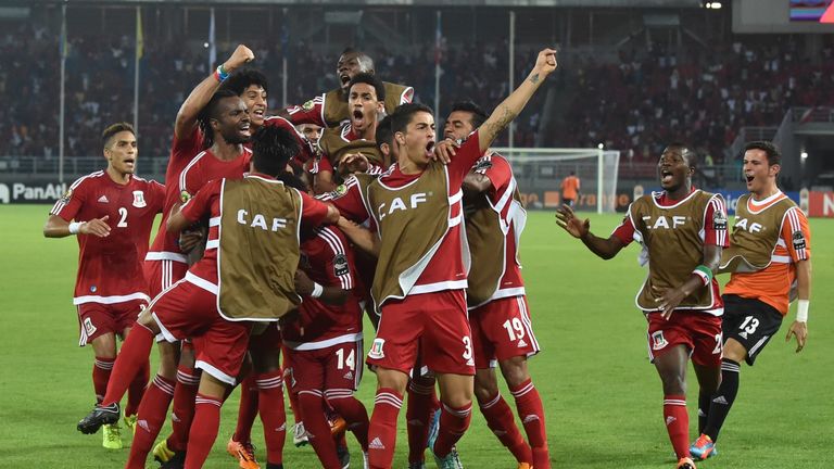 Equatorial Guinea's players celebrate after scoring a goal during the 2015 African Cup of Nations group A football match Gabon and Equatorial Guinea